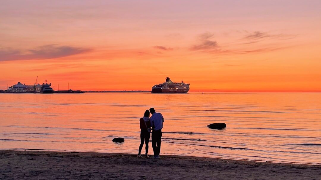 celebrity on beach at sunset